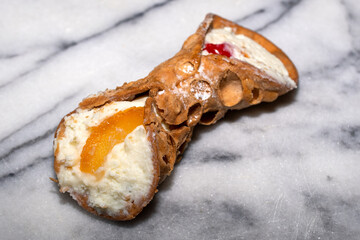 Big Italian Cannoli on a Marble Surface 