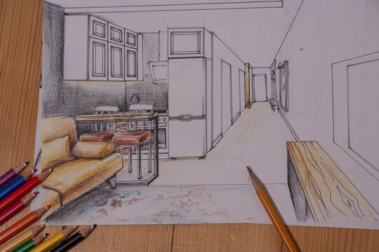 The photo shows sketches, a design project drawn with pencils on a piece of paper. Drawings, sketches, pencils, stationery on the table.