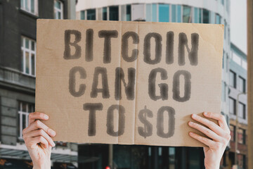The phrase " Bitcoin Can Go to $0 " is on a banner in men's hands with blurred background. Bit. Btc. Bank. Bankrupt. Arrow. Red. Drop. Future. Global. Cash. Crisis. Diagram. Falling. Growth