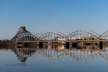 The Railway Bridge over the River Daugava in Riga, Latvia on a bright day in sprin