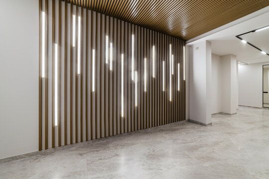 corridor design with wooden wall lighting and design renovation