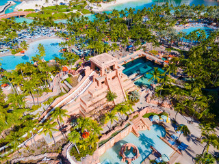 Mayan Temple water slide aerial view including Leap of Faith and Challenger Slide at Adventure Park in Atlantis Hotel on Paradise Island, Bahamas. - obrazy, fototapety, plakaty