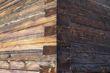 Old wooden log house wall background texture