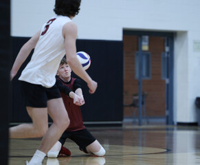 Volleyball dig by the libero