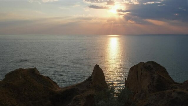 Picturesque sunset view from Stanislav clay mountains and canyons above Dnipro river bay near the Black sea, Ukraine, Kherson Grand Canyon.
