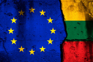 Europe Union and Lithuania crisis. Background with national flags on cracked wall photo