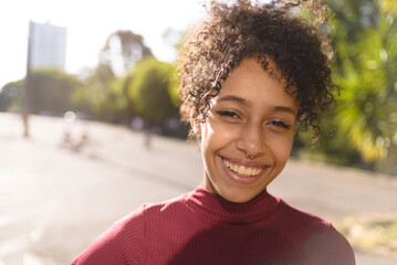 African American young woman portrait outdoors in urban landscape