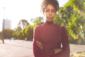 African American young woman portrait outdoors in urban landscape