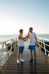 Senior couple drinking water after exercising