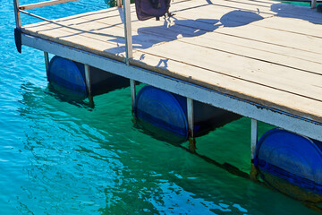 Naklejka premium Floating Dock made with empty Plastic Barrels