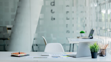 Startup company desks, empty offices, office spaces in marketing staff's offices, desks with office equipment for work, window desks. Office desk placement ideas.