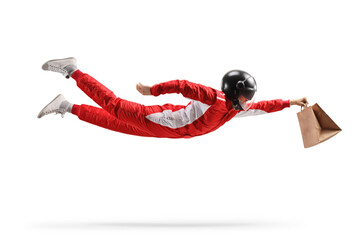 Racer in a red suit flying and carrying a fast food delivery bag