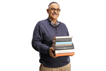 Smiling mature man holding a pile of books - obrazy, fototapety, plakaty