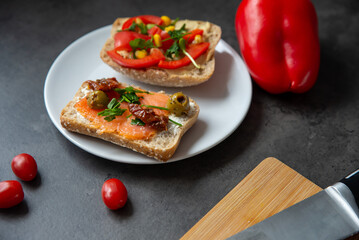 Tasty homemade breed with vegetable on stone background