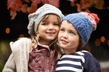 Obraz premium Hes not just my brother - hes my best friend. Portrait of a cute brother and sister standing outdoors on an autumn day.