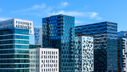 Modern glass and steel high rise office buildings in Oslo, Norway, concepts of economy, business,...