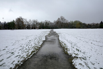 Snow covered park in a winter day