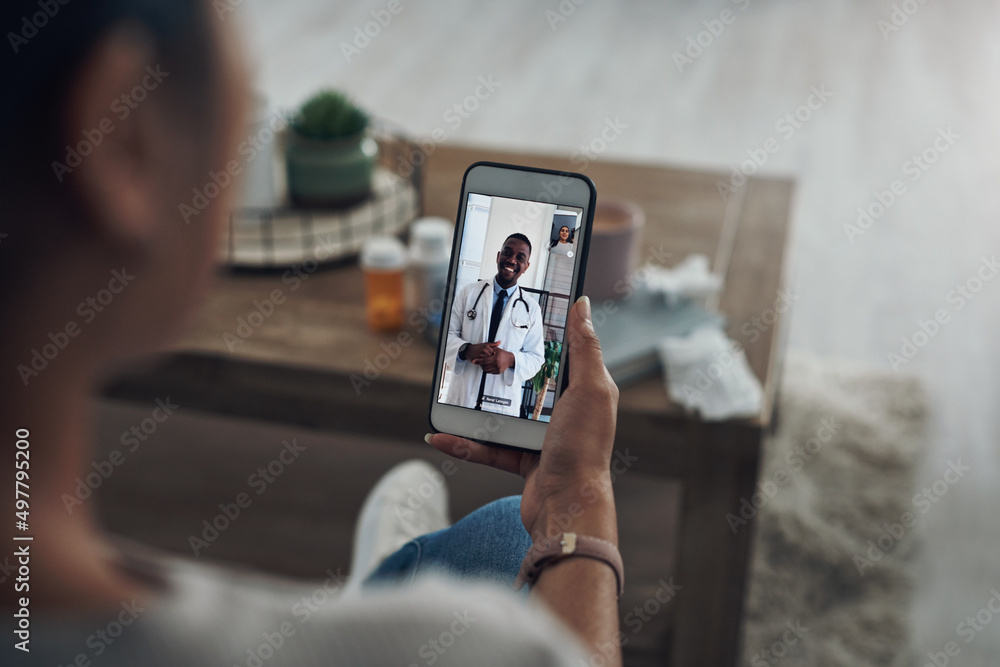 Canvas Prints This call is so informative. Shot of an unrecognizable person on a videocall with a doctor.