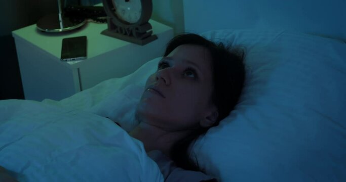 Frustrated young woman can not to fall asleep, Depressed woman suffering from insomnia