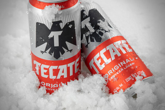 Mexico ,CDMX - April 08, 2022: Product photo of Tecate Beer with ice and white background, copy space
