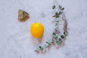  Still Life yellow and green lemons in a white stone background
