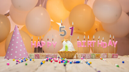 Beautiful background happy birthday number 51 with burning candles, birthday candles pink letters...