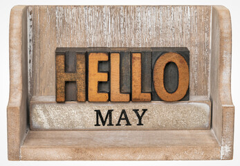 Hello May in vintage letterpress wood type inside grunge wooden box, calendar concept