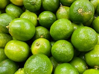 Brazilian green lemons seen up close..