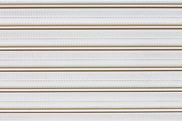 Vintage old white paint on the garage door. invoice. background. place for text