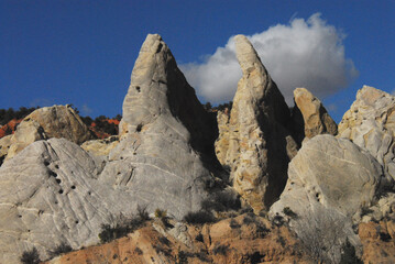 Arizona- Close Up of Cone Shaped Rock Formations Against a Blue Sky
