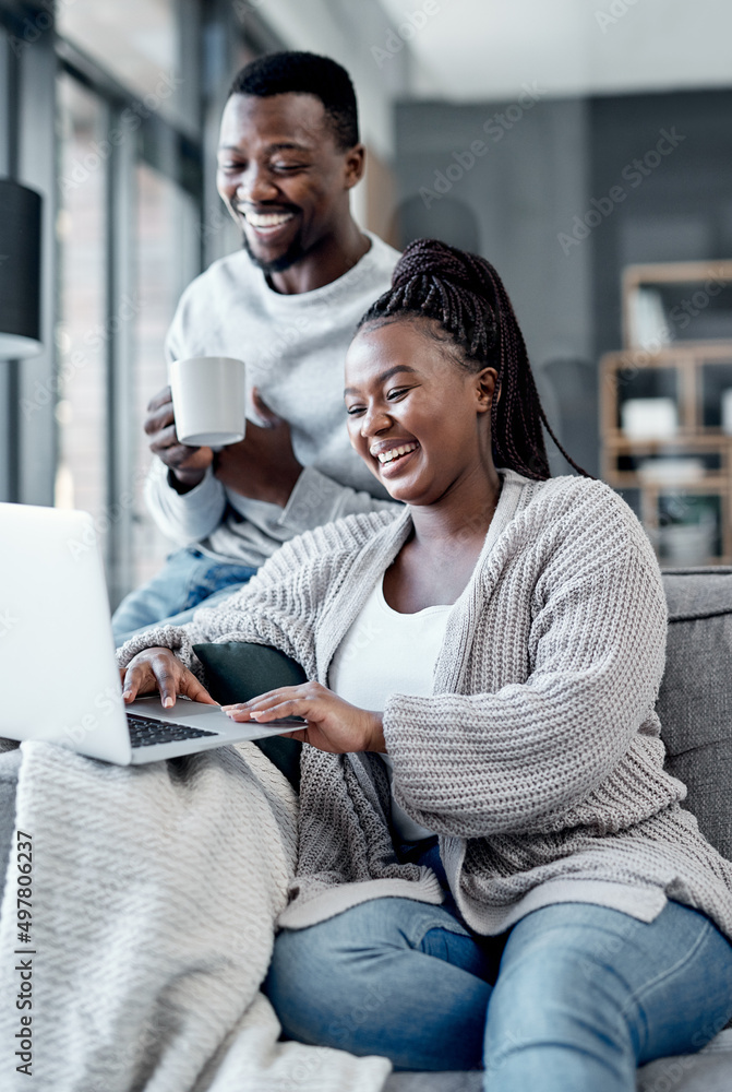 Poster whats a home without a good wifi connection. shot of a young couple using a laptop together on the s
