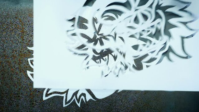 Cool Skull Artwork Is Sprayed Onto Metal
