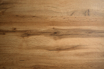 Wooden background texture. Light brown surface of old knotty wood with a natural color