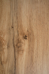 Wooden background texture. Light brown surface of old knotty wood with a natural color
