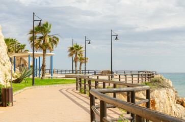 Beautifully landscaped city promenade along the coast of the Mediterranean Sea on the Costa del Sol in Spain