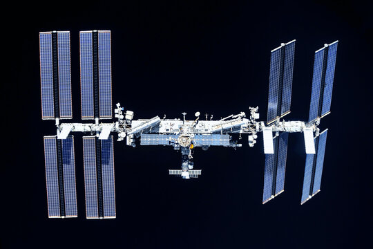 ISS on a dark background. Elements of this image furnished by NASA