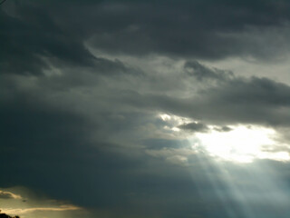 Cloudy and gray skies that let in a few rays of light