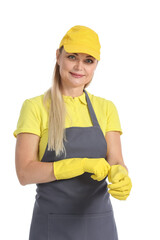 Worker of cleaning service putting on rubber gloves against white background