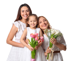 Young woman, her little daughter and mother with flowers on white background. International Women's Day celebration
