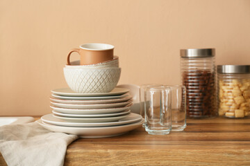 Set of clean tableware in kitchen