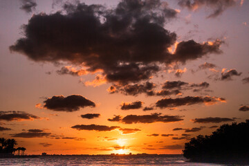 Fototapeta na wymiar Sunset at sea beautiful sunset sky and clouds