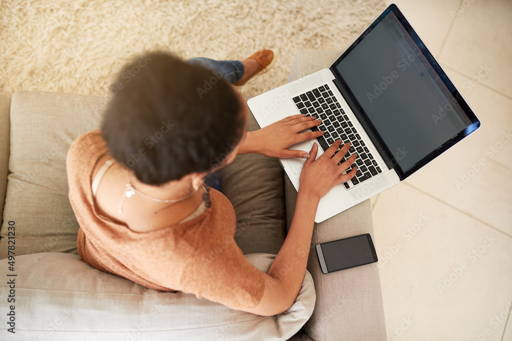 Poster finally weekend and i can get my blog on. shot of an unrecognizable woman using a laptop at home.