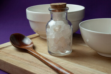 Fototapeta na wymiar bowl and bottle with sea salt