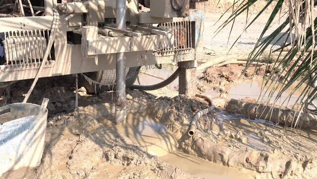 The an artesian drilling machine is drilling an artesian well in factory.