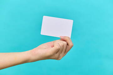 female hand hold card