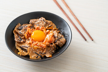 pork bulgogi rice bowl with kimchi and Korean pickled egg
