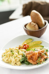 scrambled eggs with smoked salmon and avocado healthy breakfast