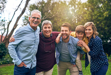 Home is where our family is. Shot of a multigenerational family outside. - Powered by Adobe