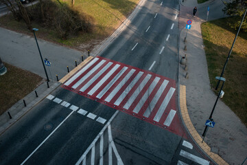Road markings and pedestrian crossing.
