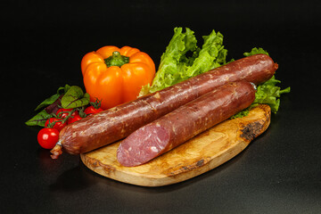 Pork ham sausage cut isolated
